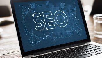 SEO for Startups displayed on a laptop screen.